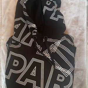 Authentic Ivy Park by Beyoncé, black hoodie with white abstract lettering.